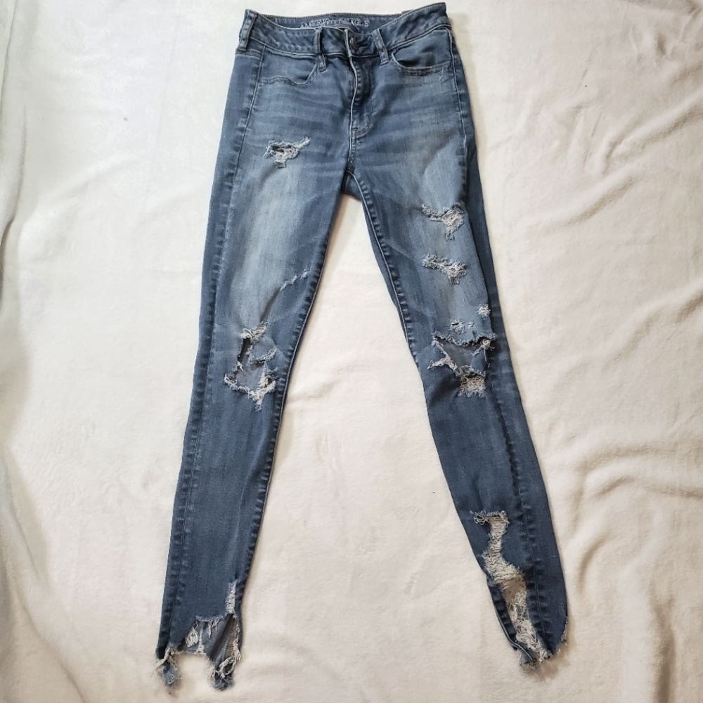 American Eagle High Rise Jegging Next Level Stretch Blue Jeans Size 2 Distressed